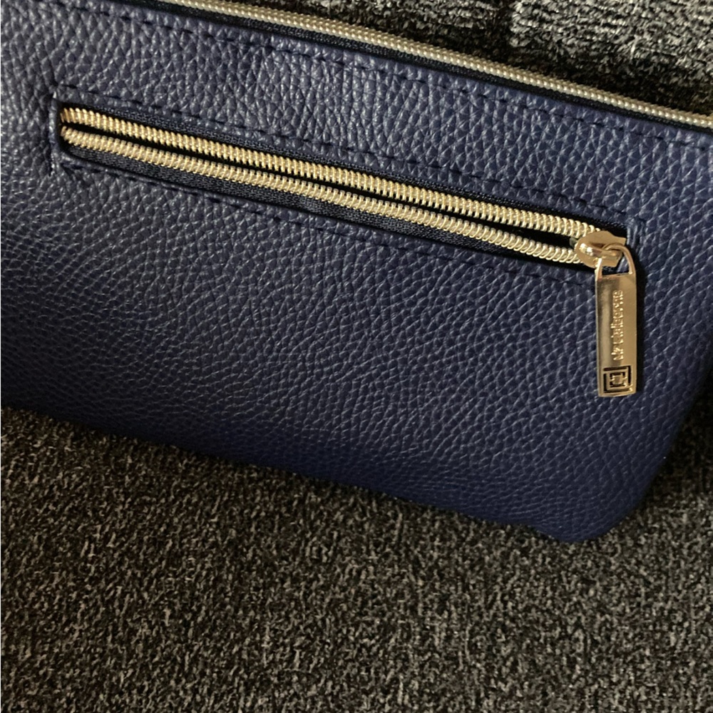 Liz Claiborne blue wristlet with built in power bank